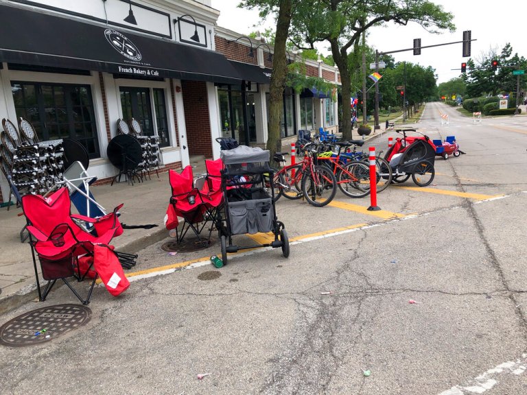Terrified parade-goers fled Highland Park's Fourth of July parade after shots were fired, leaving behind their belongings as they sought safety, Monday, July 4, 2022, in Highland Park, Illinois.