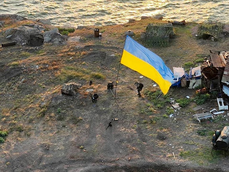 Ukrainian soldiers raise country’s flag on reclaimed ‘Snake Island’