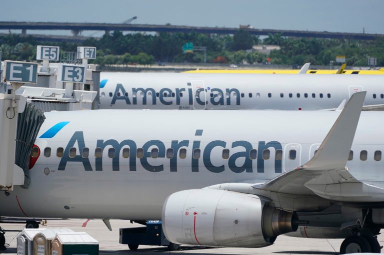 Two American Airlines Boeing 737s are shown at the gate, Thursday, July 7, 2022, at the Fort Lauderdale-Hollywood International Airport in Fort Lauderdale, FL. American Airline passengers flying from North Carolina to New York spent most of a nearly six-hour delay sitting on hot planes Sunday afternoon due to maintenance issues and a weather delay, the airline said. (AP Photo/Wilfredo Lee)