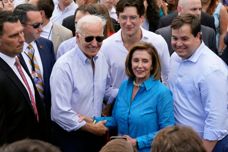 President Joe Biden speaks with House Speaker Nancy Pelosi of California, at the White House Congressional Picnic on the South Lawn of the White House, July 12, 2022, in Washington. 