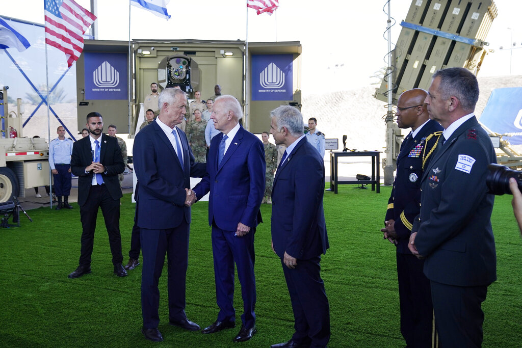 A touchy subject: Biden struggles with new no-handshake rule in Middle East