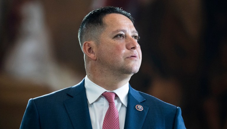 Rep. Tony Gonzales, R-Texas, is seen before the flag-draped casket bearing the remains of Hershel W. 