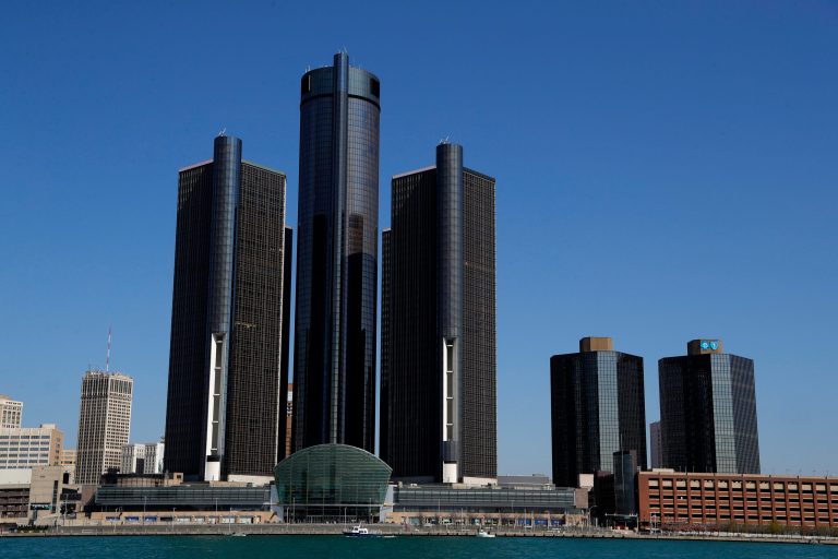 This May 12, 2020, file photo shows a general view of the Renaissance Center, headquarters for General Motors, along the Detroit skyline from the Detroit River.