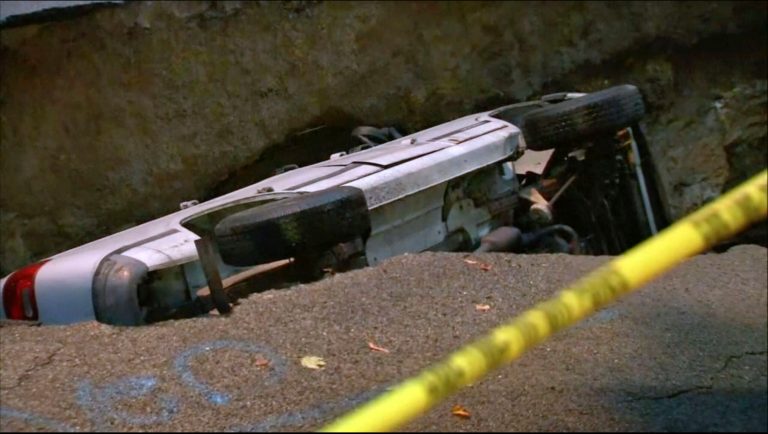 The van was removed and the sinkhole was being filled on Tuesday while the New York City Department of Environmental Protection was investigating the cause.