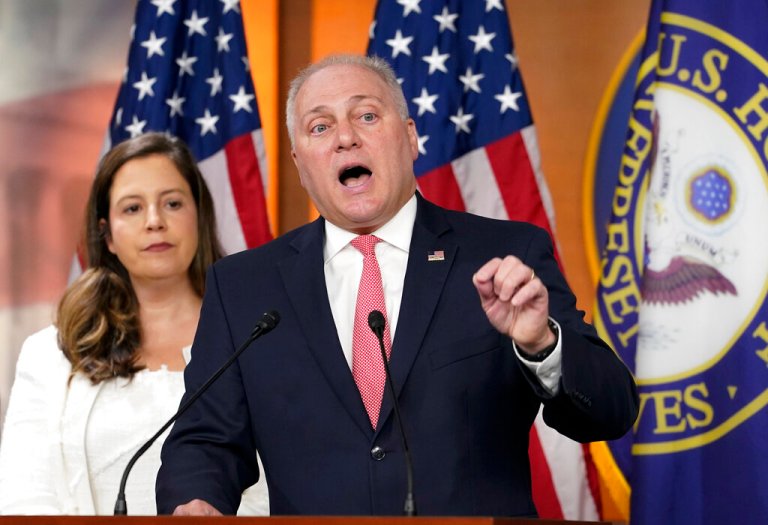 Rep. Elise Stefanik, R-N.Y., left, listens as House Minority Whip Rep. Steve Scalise, R-La., speaks during a news conference at the Capitol in Washington, Tuesday, July 19, 2022. 