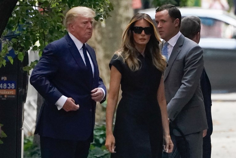 Former President Donald Trump, left, arrives with Melania Trump for the funeral of Ivana Trump.