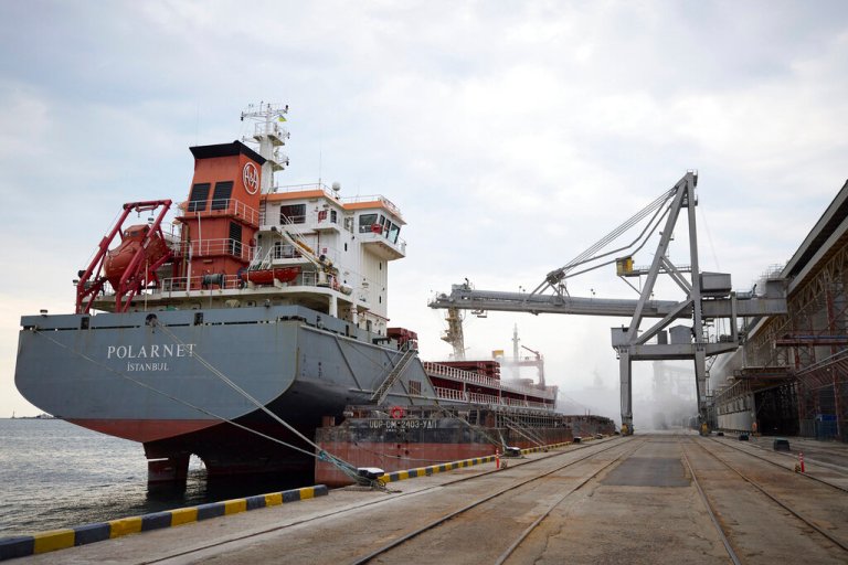 In this photo provided by the Ukrainian Presidential Press Office, a Turkish Polarnet cargo ship is loading Ukrainian grain in a port in Odesa region, Ukraine, Friday, July 29, 2022.