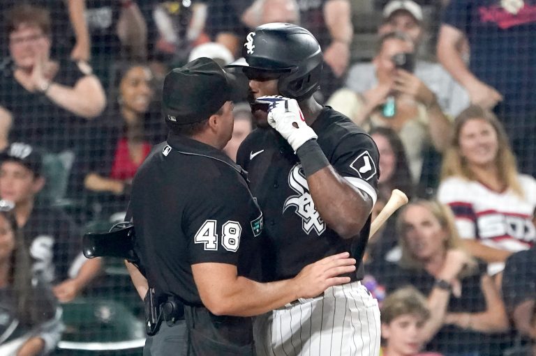 Chicago White Sox's Tim Anderson, right, makes a point to umpire Nick Mahrley after Anderson made contact with Mahrley during the seventh inning of the team's baseball game against the Oakland Athletics on Friday, July 29, 2022, in Chicago.