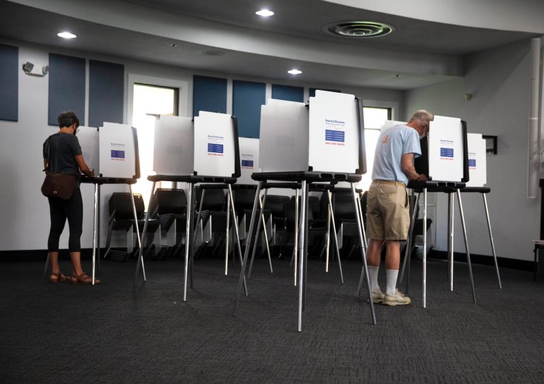 Voters cast their vote in the Blue Ash, Ohio Municipal building for the primary on Aug. 2. 