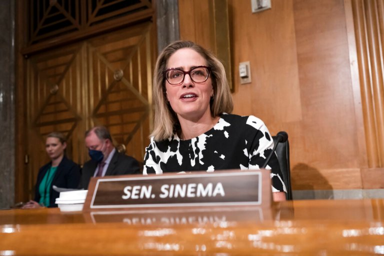 Senate Democrats wait as Sinema considers supporting Manchin-backed spending bill