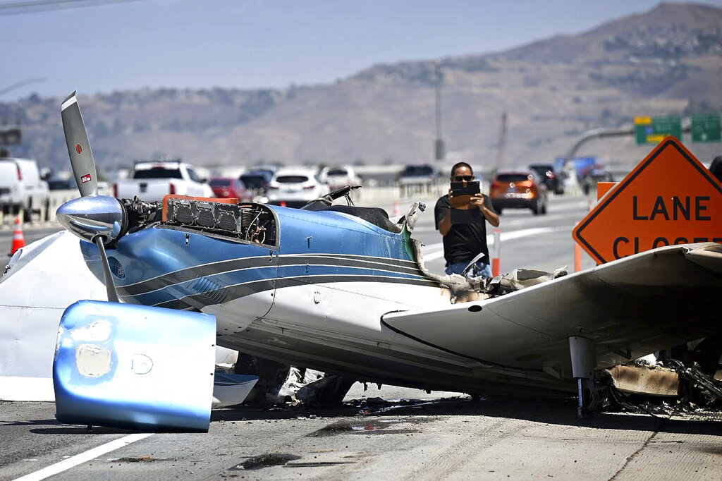 Small plane makes crash landing on California freeway