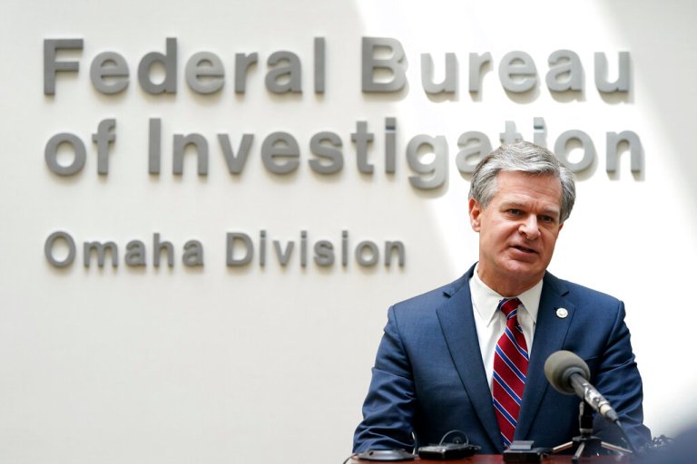 FBI Director Christopher Wray speaks during a news conference in Omaha, Nebraska.