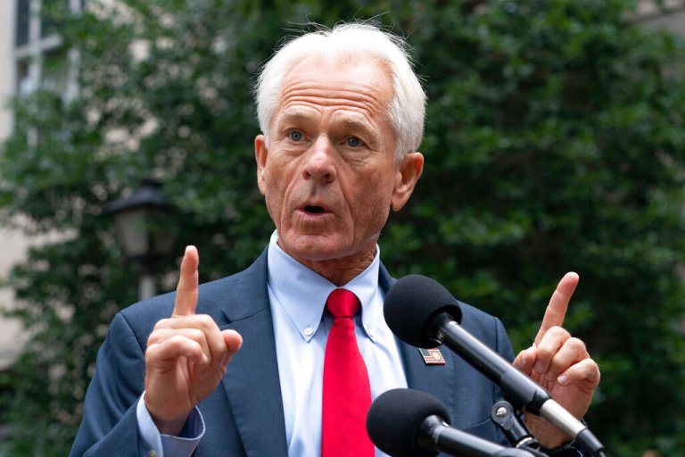 Former Trump White House advisor Peter Navarro speaks to the media as he leaves federal court in Washington, Thursday, Aug. 11, 2022.