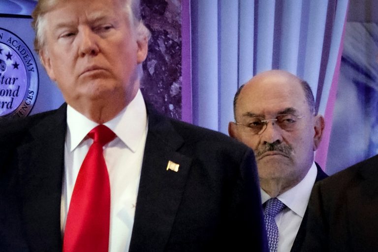 FILE - Allen Weisselberg, right, stands behind then President-elect Donald Trump during a news conference in the lobby of Trump Tower in New York, Jan. 11, 2017.