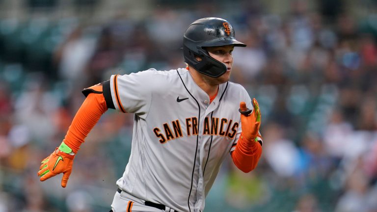 San Francisco Giants' Joc Pederson runs out a single against the Detroit Tigers in the fourth inning of a baseball game in Detroit, Tuesday, Aug. 23, 2022. The Giants are selling t-shirts that say âSAN FRANâ on them, a name hated by local San Francisco residents. (AP Photo/Paul Sancya)