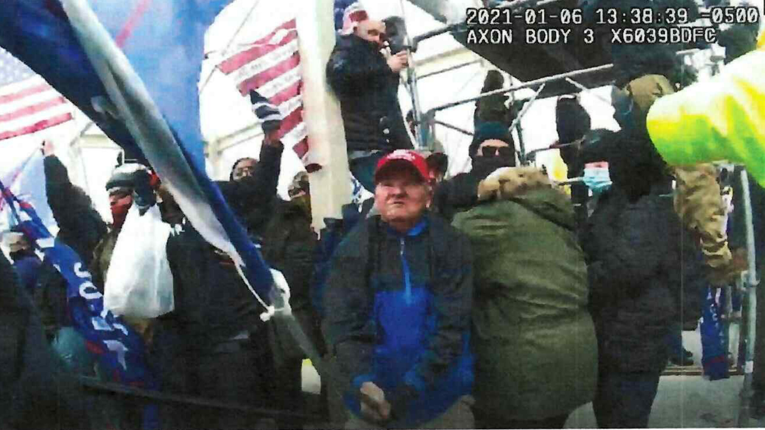 WATCH: New Jan. 6 footage shows mob using enormous Trump sign as battering ram