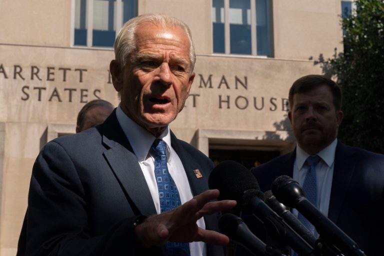 Former White House trade adviser Peter Navarro speaks to members of the media outside the federal court in Washington, following a status conference on contempt of Congress charges for his refusal to comply with a subpoena issued by the Select Committee to Investigate the January 6th attack on the United States Capitol, Wednesday, Aug. 31, 2022.