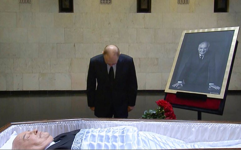 Russian President Vladimir Putin pays his last respect near the coffin of former Soviet President Mikhail Gorbachev at the Central Clinical Hospital in Moscow Russia.