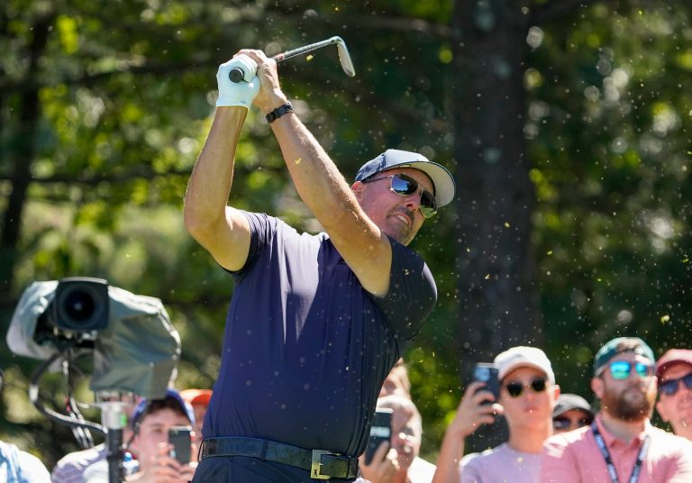Phil Mickelson follows through on a tee shot on the second hole during the first round of the LIV Golf tournament, Friday, Sept. 2, 2022, in Bolton, Massachusetts. 