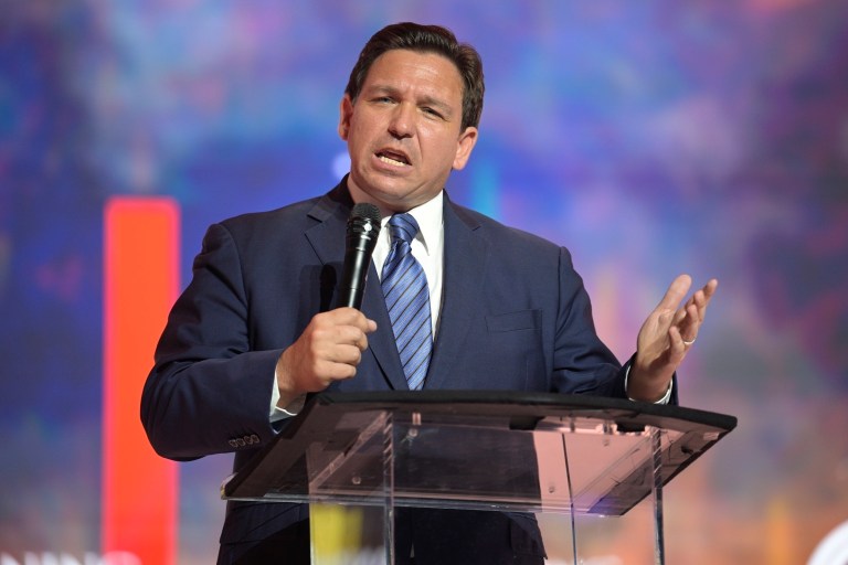 Florida's Republican Gov. Ron DeSantis addresses attendees during the Turning Point USA Student Action Summit on July 22.