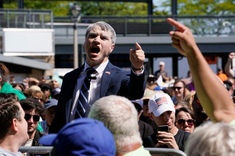 A heckler in the crowd as President Joe Biden speaks during an event at Henry Maier Festival Park in Milwaukee, Monday, Sept. 5, 2022. Biden is in Wisconsin this Labor Day to kick off a nine-week sprint to the crucial midterm elections.