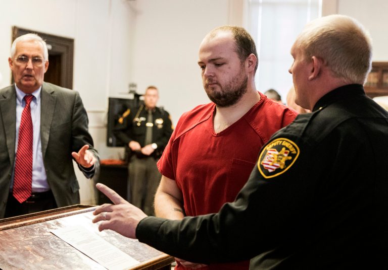 George Wagner IV, center, is escorted out of the courtroom after his arraignment on Nov. 28, 2018, at the Pike County Courthouse, in Waverly, Ohio.