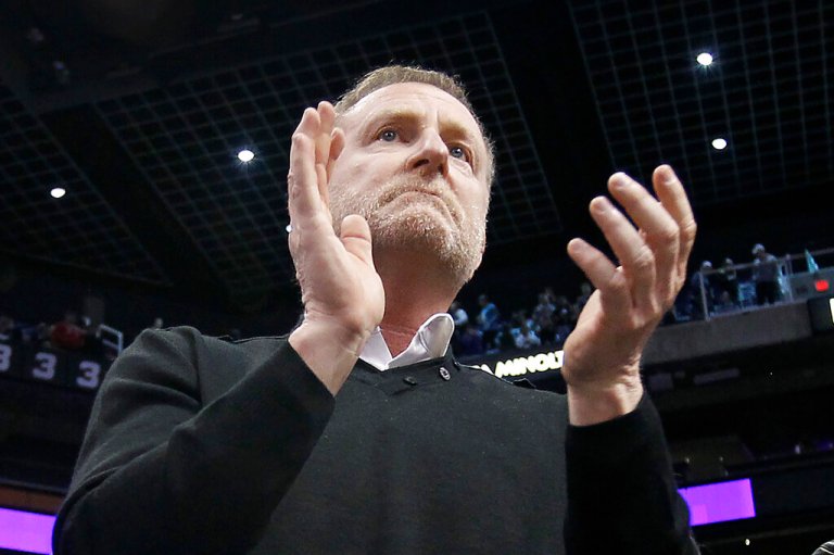 Phoenix Suns owner Robert Sarver applauds the teams 107-99 victory against the Minnesota Timberwolves during an NBA basketball game on Dec. 15, 2018, in Phoenix.
