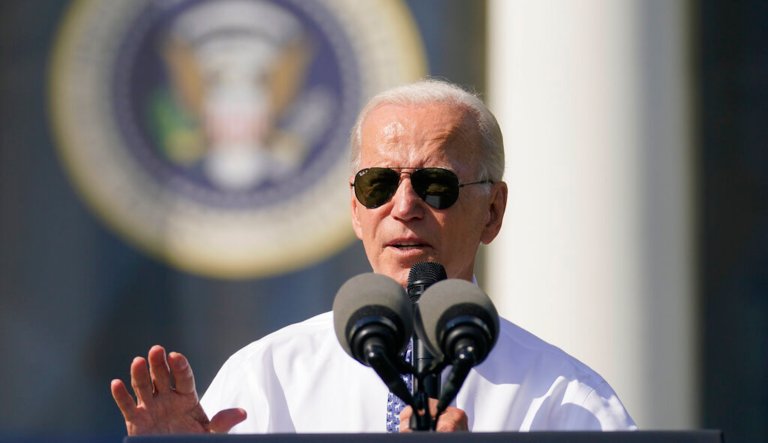 President Joe Biden speaks on the South Lawn of the White House.