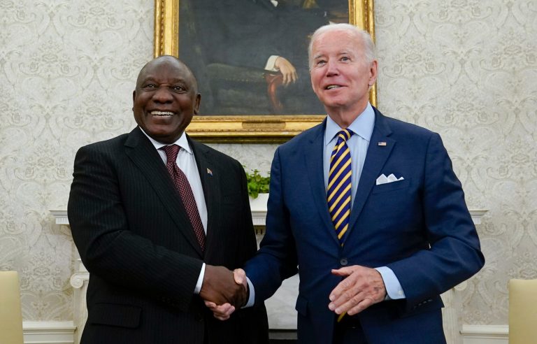 President Joe Biden shakes hands with South African President Cyril Ramaphosa as they meet in the Oval Office of the White House, Friday, Sept. 16, 2022, in Washington.