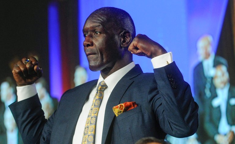 Shelby Jordan, a former linebacker from Washington University in St. Louis, is recognized during the National Football Foundation enshrinement ceremony Aug. 28, 2013.