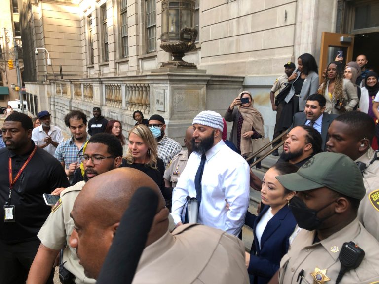 Adnan Syed, center, leaves the Elijah E. Cummings Courthouse, Monday, Sept. 19, 2022, in Baltimore. A judge has ordered the release of Syed after overturning his conviction for a 1999 murder that was chronicled in the hit podcast âSerial.â
