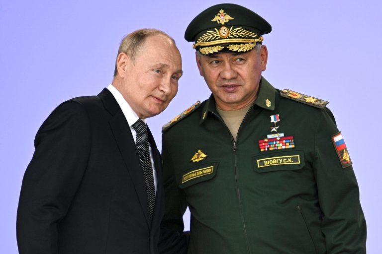 FILE Russia's President Vladimir Putin and Russian Defense Minister Sergei Shoigu attend the opening of the Army 2022 International Military and Technical Forum in the Patriot Park outside Moscow, Russia, Monday, Aug. 15, 2022. Putin has announced a partial mobilization in Russia as the fighting reaches nearly seven months. Putin's address to the nation on Wednesday, Sept. 21, 2022 comes a day after Russian-controlled regions in eastern and southern Ukraine announced plans to hold votes on becoming integral parts of Russia. 