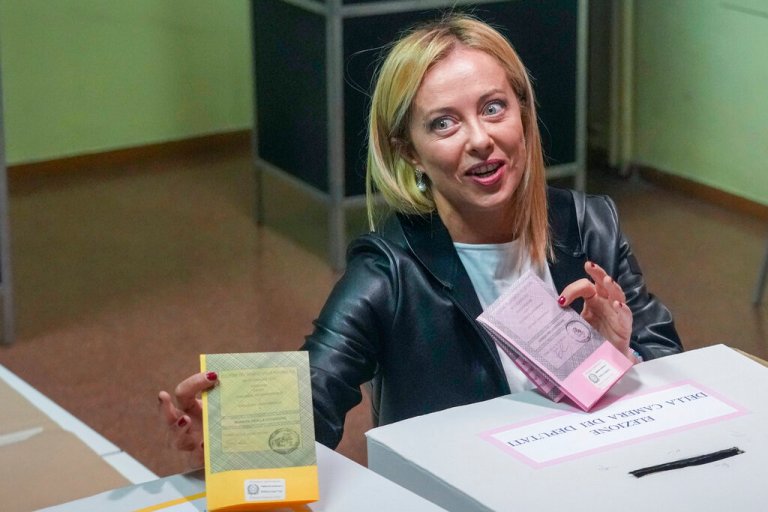 Far-right Brothers of Italy's leader Giorgia Meloni votes at a polling station in Rome, Sunday, Sept. 25, 2022. Italians are voting in a national election that might yield the nation's first government led by the far right since the end of World War II.