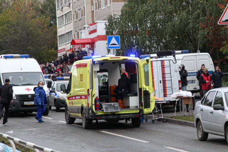 Police and paramedics work at the scene of a shooting at school No. 88 in Izhevsk, Russia, Sept. 26.