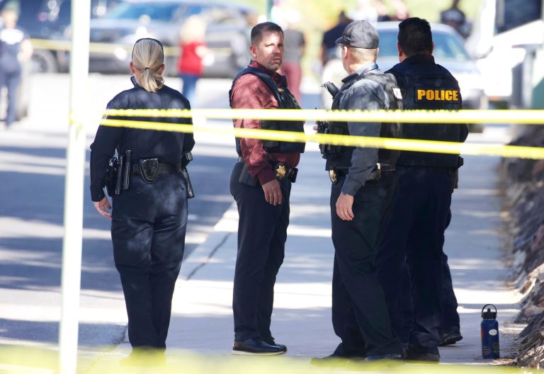 Law enforcement work at the scene of shooting at the John W. Harshbarger Building on the University of Arizona campus in Tucson, Arizona.