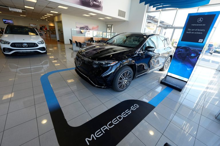 An unsold 2023 EQS 580 electric sports-utility vehilce sits on the showroom floor of a Mercedes Benz dealership Monday, Oct. 17, 2022, in Loveland, Colorado.
