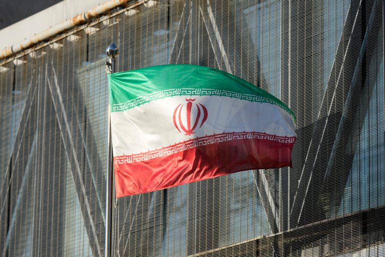Iran's national flag flutters at the Iran embassy in Seoul, South Korea, Tuesday, Oct. 18, 2022. A group of girls were beaten up by security forces for refusing to sing a pro-regime anthem, with one of the girls, Asra Panahi, reportedly dying in a hospital of injuries sustained at the school according to the Coordinating Council of Iranian Teachersâ Trade Associations. (AP Photo/Lee Jin-man)