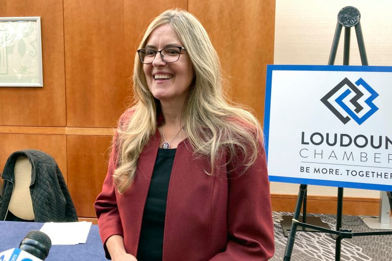 Incumbent Rep. Jennifer Wexton speaks with reporters after a debate with Republican challenger Hung Cao, Thursday, Oct. 20, 2022, in Leesburg, Virginia. They are running to represent Virginia's 10th Congressional District. 