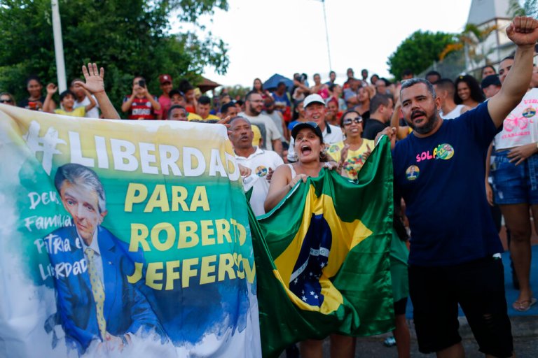 Supporters of former lawmaker Roberto Jefferson protest against his arrest next to his house in Levy Gasparian, Rio de Janeiro state, Brazil, Sunday, Oct. 23, 2022. 