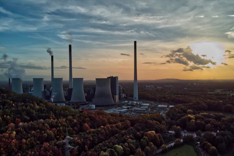 The sun sets behind the cole-fired power plant 'Scholven' of the Uniper energy company in Gelsenkirchen, Germany, on Oct. 22. 