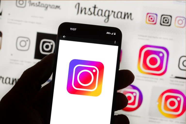 The Instagram logo is seen on a cell phone, Oct. 14, 2022, in Boston. Instagram said it was working on an issue that left a seemingly large number of users locked out of their accounts Monday, Oct. 31, 2022. Some users reported seeing a message that they were locked out but were still able to scroll through their feeds. 
