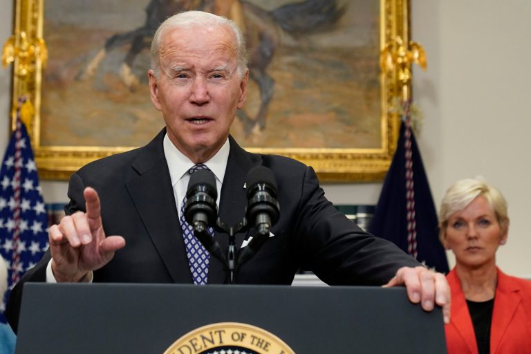 President Joe Biden speaks about gas prices and oil companies profits, in the Roosevelt Room of the White House, on Oct. 31 in Washington, as Energy Secretary Jennifer Granholm listens.