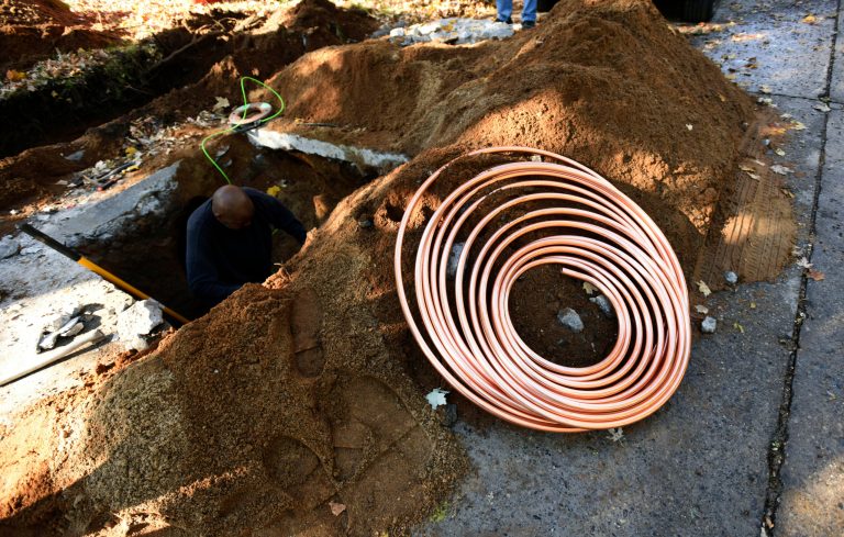 New water lines are installed at a home along Ogden Avenue in Benton Harbor, Michigan.