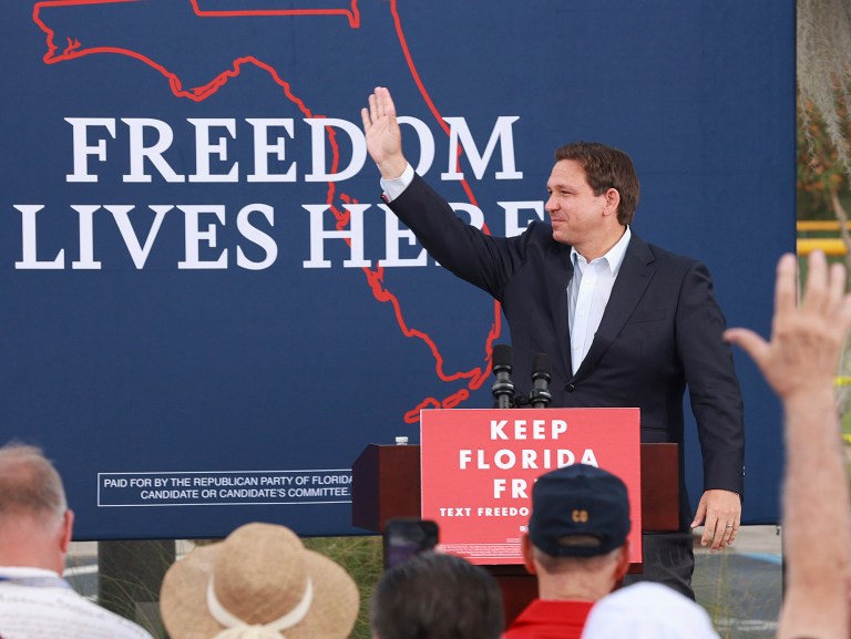 Florida Gov. Ron DeSantis waves during a rally at Freedom Park in the Solivita retirement community in Poinciana, Fla., on Nov. 3.