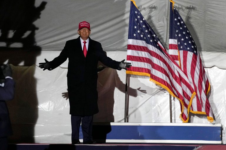 Former President Donald Trump arrives to speak at a rally, Thursday, Nov. 3, 2022, in Sioux City, Iowa. 