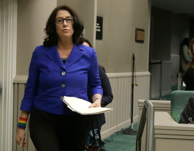 Christine Pelosi walks to the dais to speak before an Assembly subcommittee in Sacramento, Calif., on Nov. 28, 2017. 