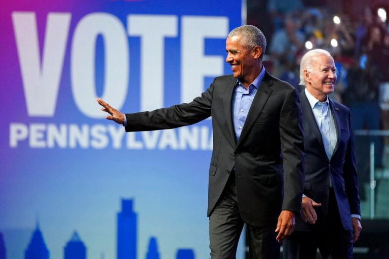 Former President Barack Obama and President Joe Biden arrive at a campaign rally for Pennsylvania's Democratic gubernatorial candidate Josh Shapiro and Democratic Senate candidate Lt. Gov. John Fetterman, Saturday, Nov. 5, 2022, in Philadelphia.