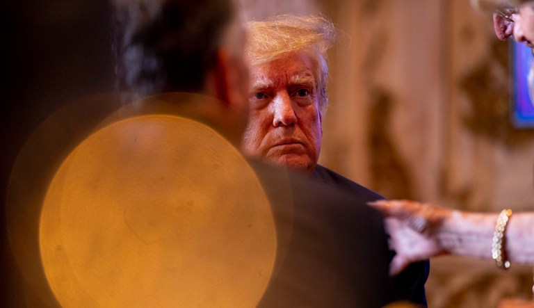 Former President Donald Trump speaks to guests at Mar-a-lago on Election Day, Tuesday, Nov. 8, 2022, in Palm Beach, Fla.
