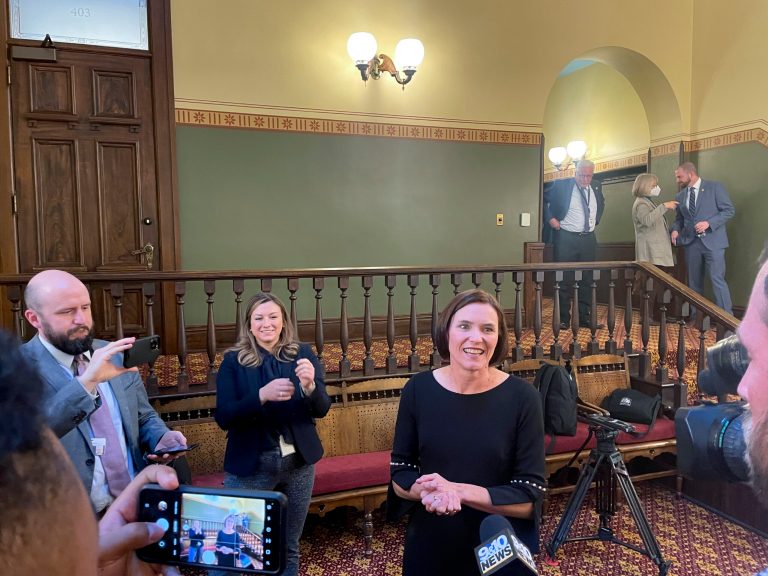 Michigan state Sen. Winnie Brinks stands before reporters in the state Capitol in Lansing, Mich., on Thursday, Nov. 10, 2022, minutes after Senate Democrats voted to make her the chamberâs first female leader. 