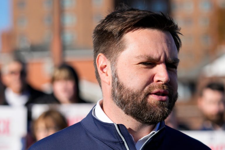 Ohio Senate candidate JD Vance speaks with reporters outside of a polling location in Cincinnati, Tuesday, Nov. 8, 2022. 